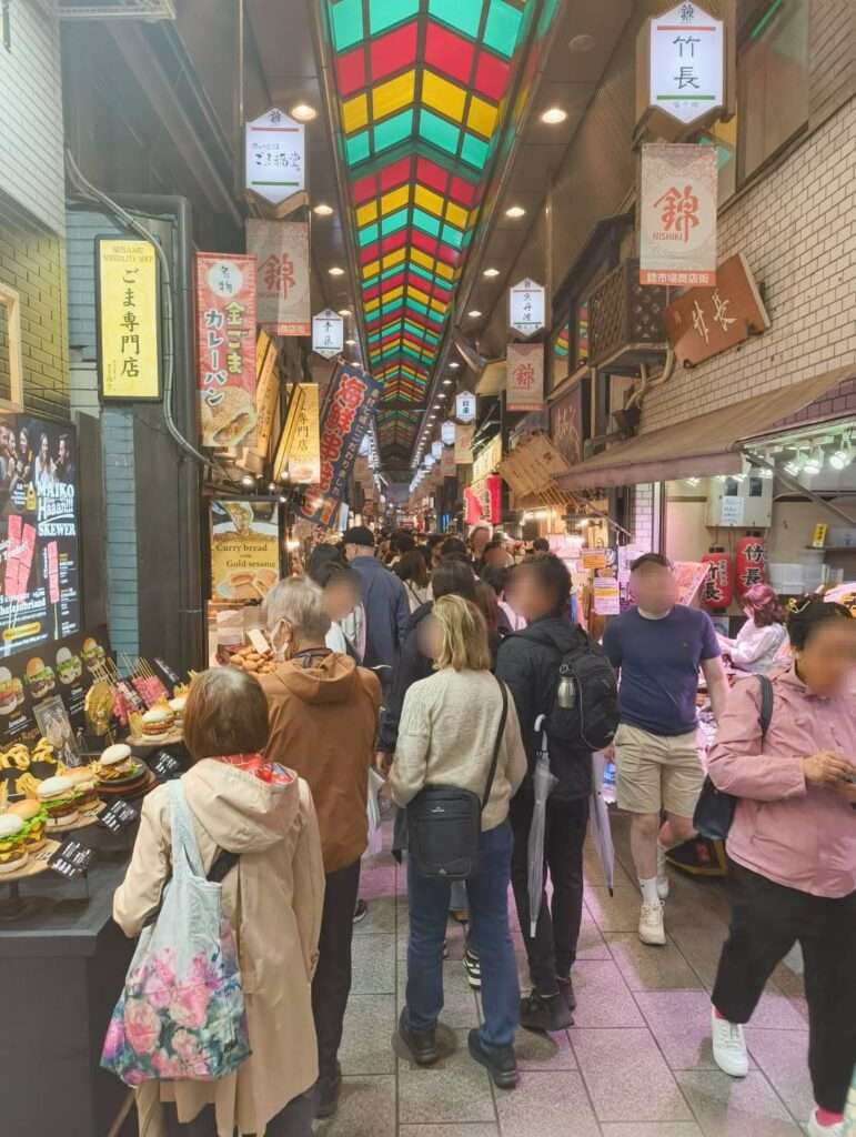 crowds inside on of the covered markets in Osaka